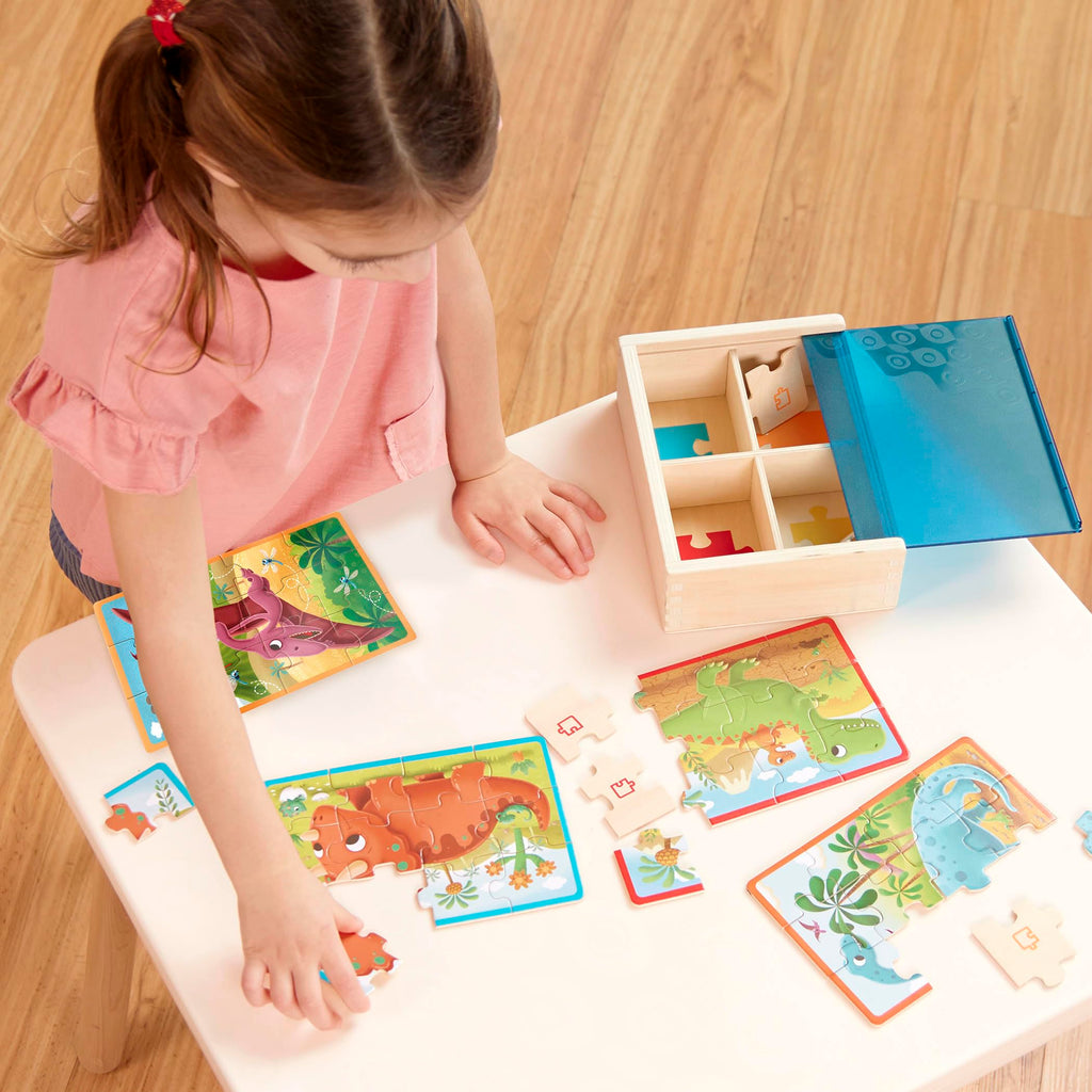 B. toys Pack o' Puzzles: 4 Wooden Dinosaur Jigsaw Puzzles for Kids Ages 3+