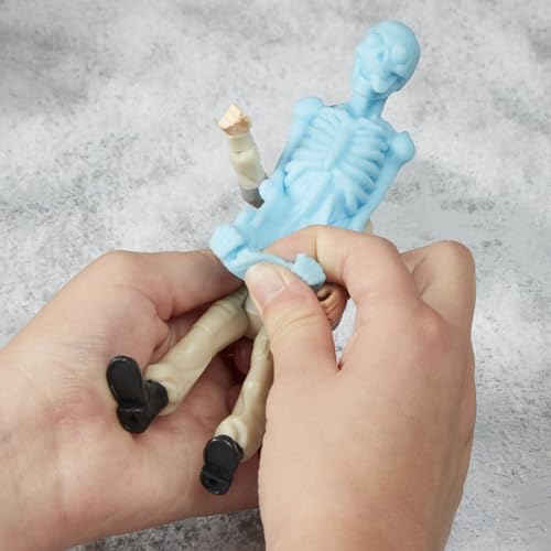 Ghostbusters Fright Features Phoebe Spengler Action Figure with Stretchy Bonesy Ghost and Proton Pack
