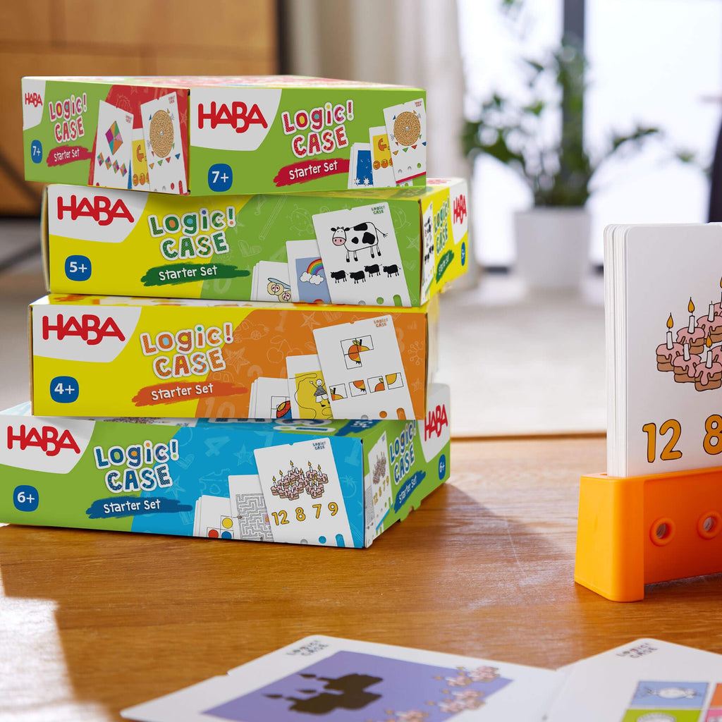HABA Logic! CASE Starter Set 6+ – 77 Brain Teaser Puzzles for Kids, Travel Game with Self-Checking Wooden Peg