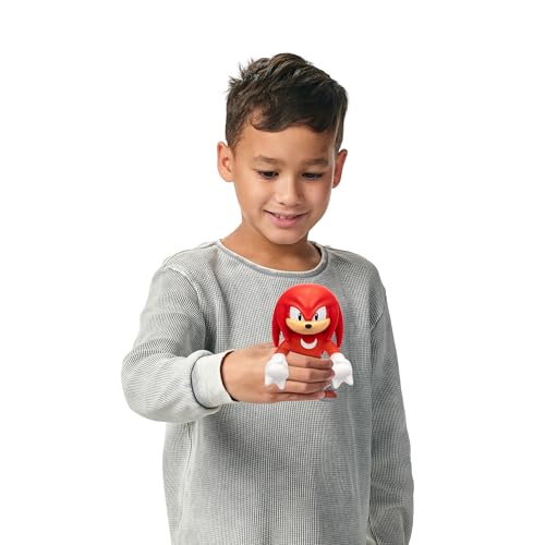 Heroes of Goo Jit Zu Unstoppable Surge Knuckles – Glow-in-the-Dark Stretchy Action Figure with Bead Filling