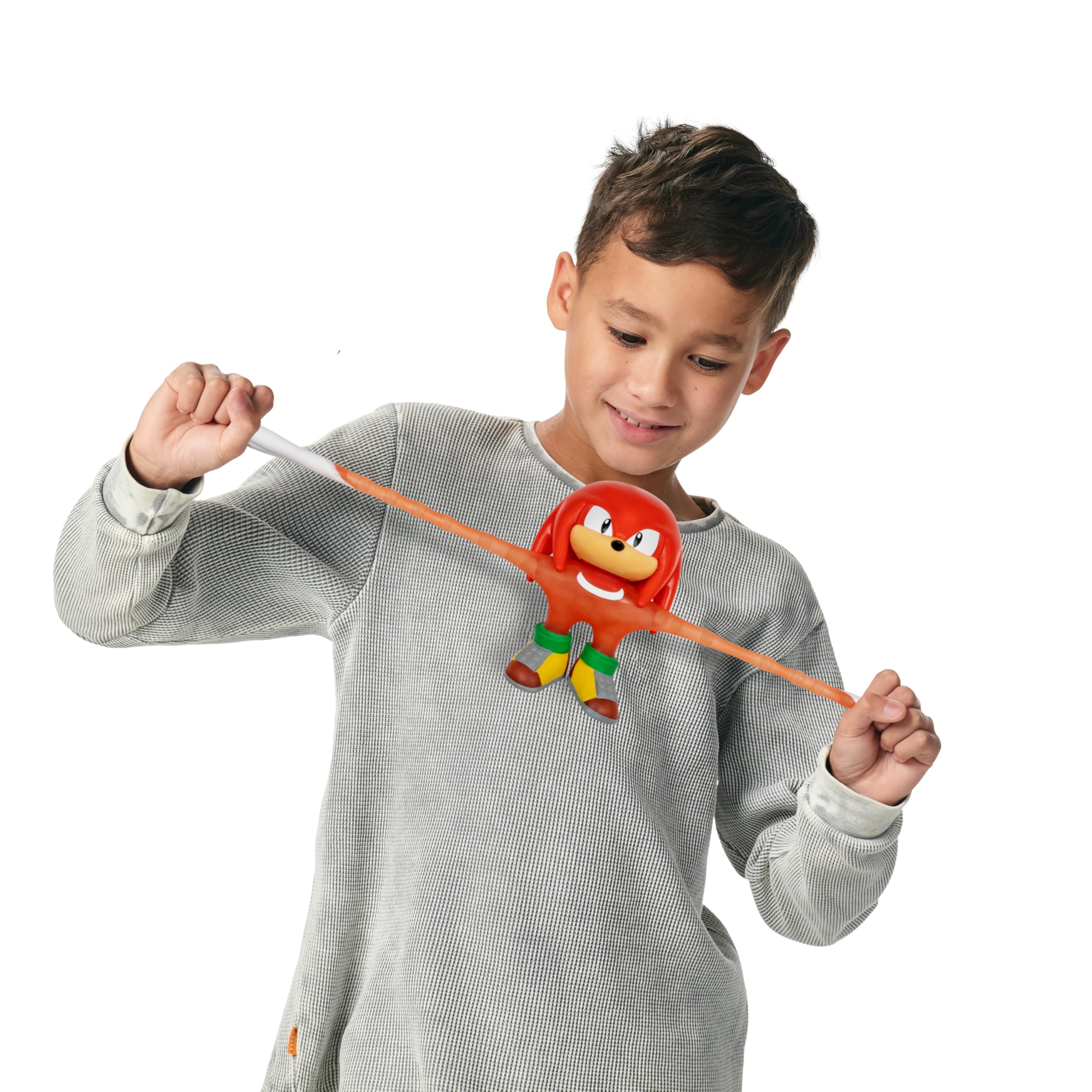 Heroes of Goo Jit Zu Unstoppable Surge Knuckles – Glow-in-the-Dark Stretchy Action Figure with Bead Filling