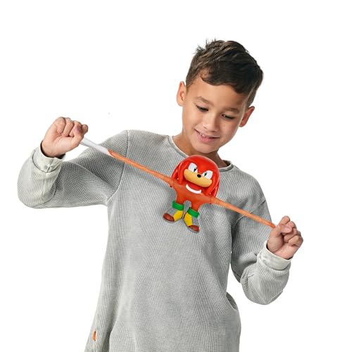 Heroes of Goo Jit Zu Unstoppable Surge Knuckles – Glow-in-the-Dark Stretchy Action Figure with Bead Filling