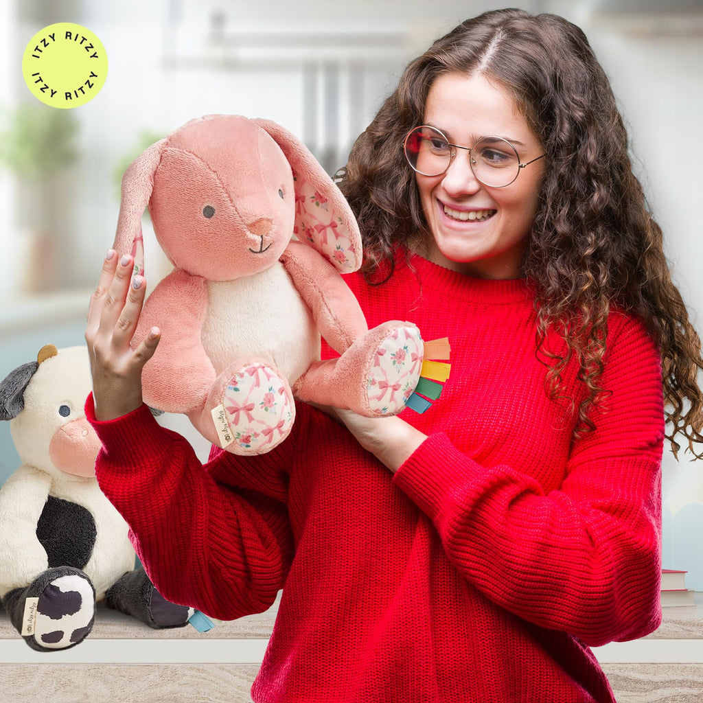 Itzy Ritzy Snuggleverse Pink Bunny Plush – Soft Minky Stuffed Animal with Sensory Ribbons for Babies & Up