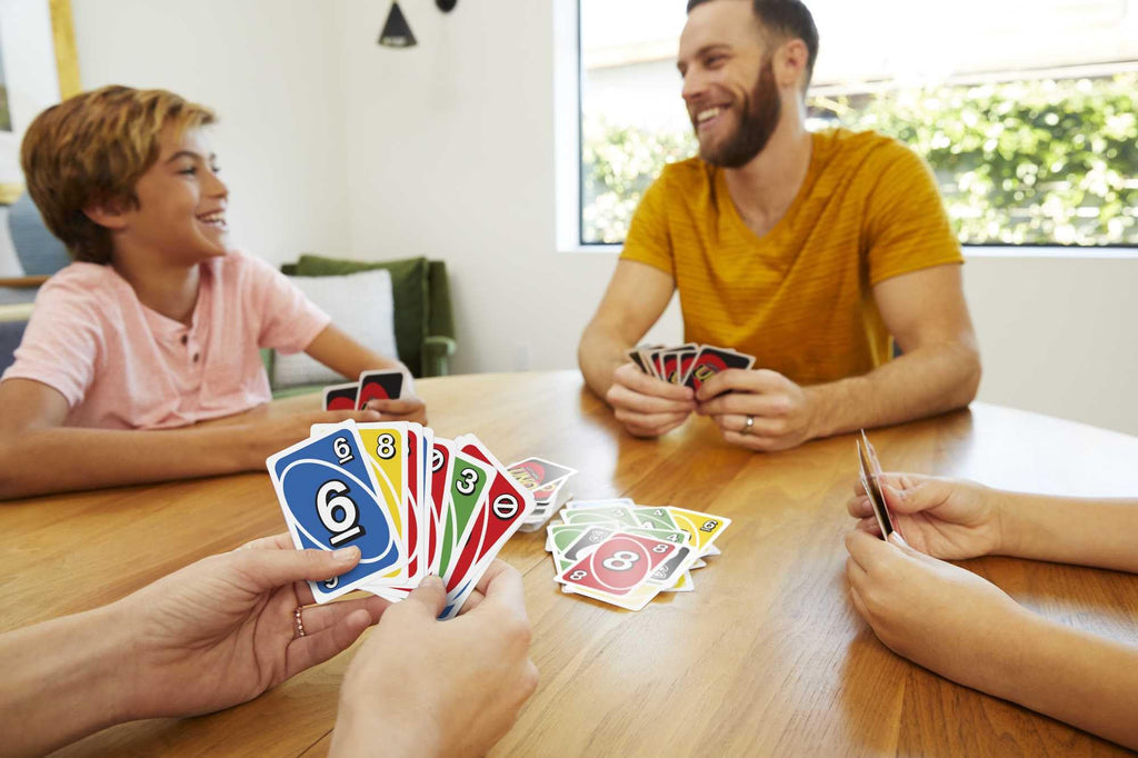 Left-Handed UNO Card Game in Collector's Tin – Designed for Southpaws, Fun for Everyone