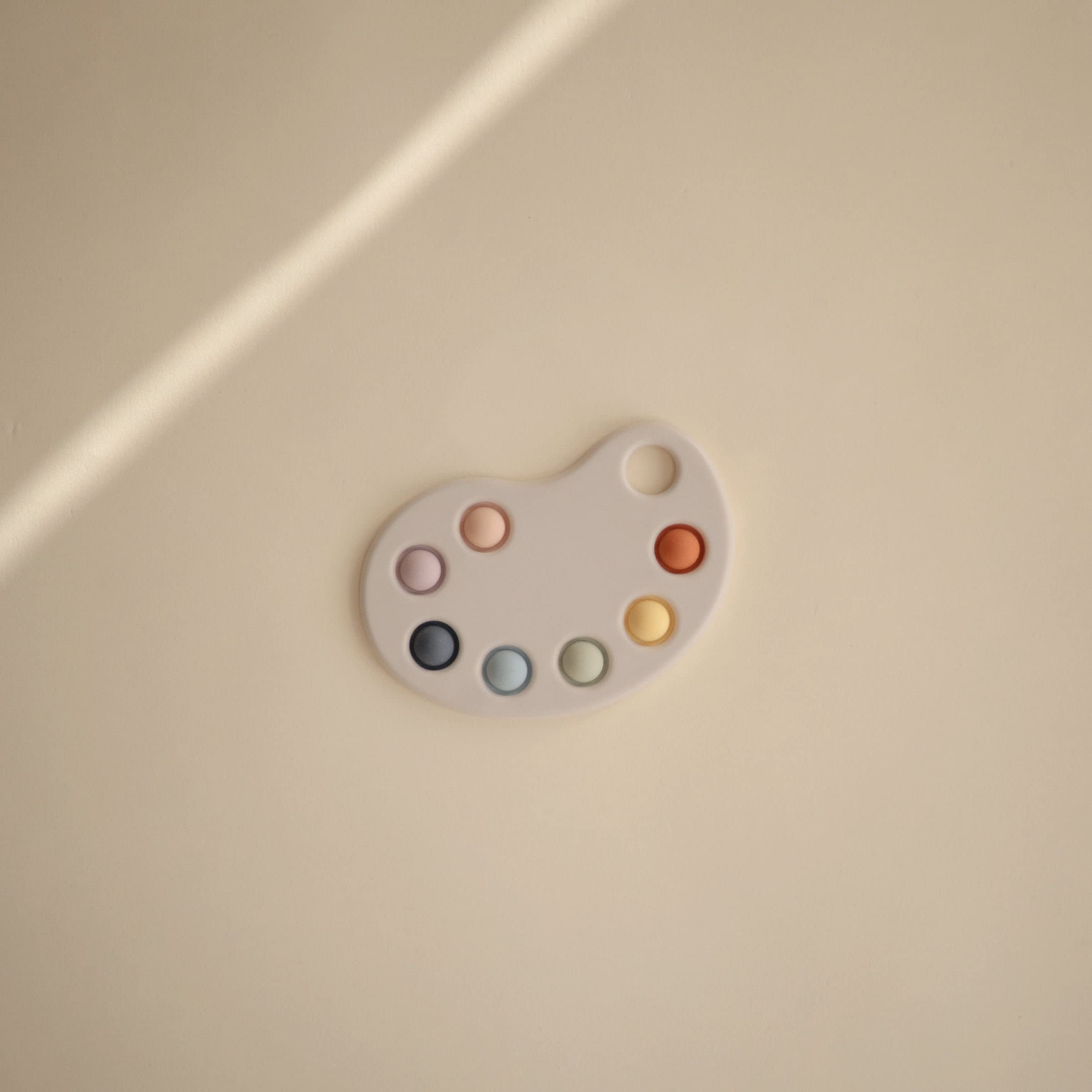 mushie Paint Palette Press Toy – Soft Silicone Pop Fidget for Baby Sensory Play