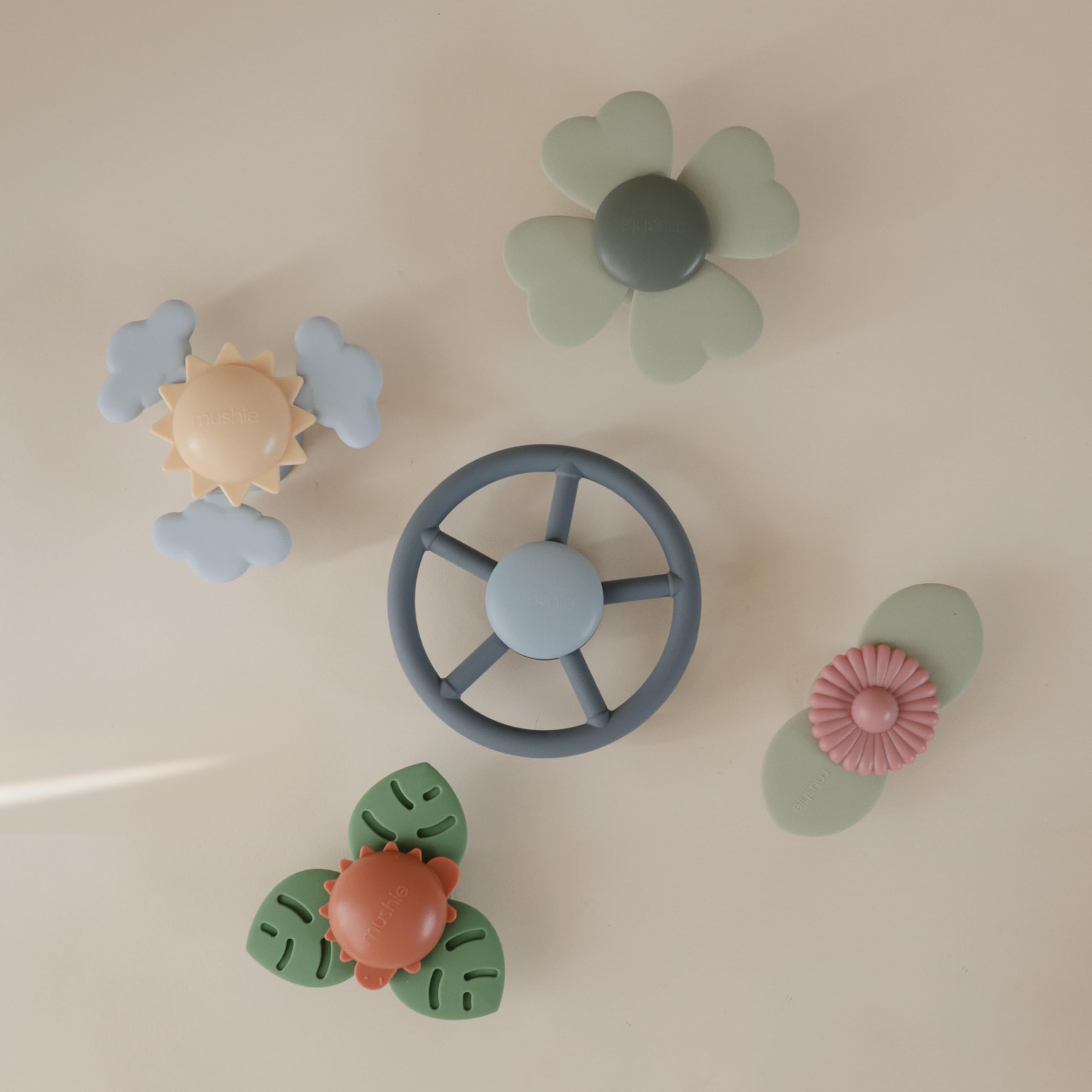 mushie Wheel Suction Spinner Toy – Dinosaur Sensory Toy for Bath and Travel
