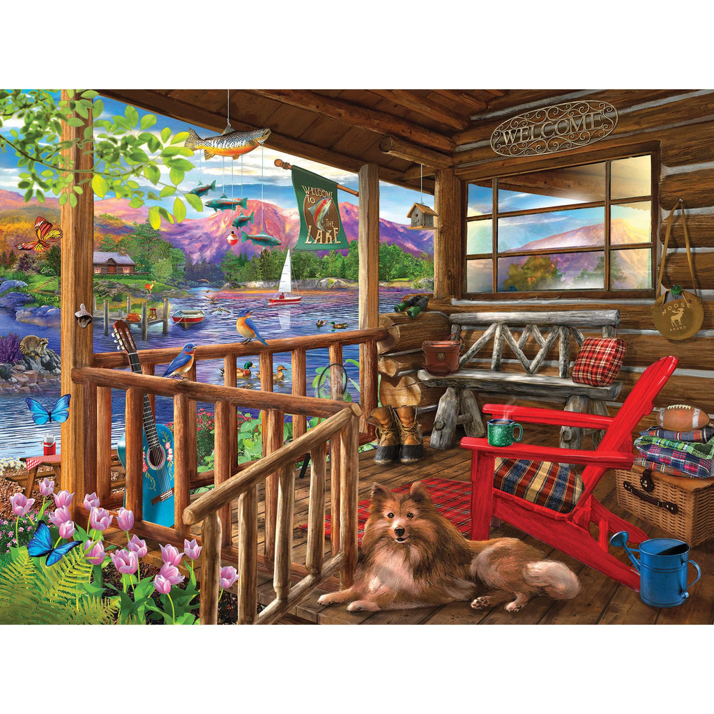 RoseArt Bigelow Illustrations Porch Life 500 Piece Jigsaw Puzzle – Lake Cabin Scene