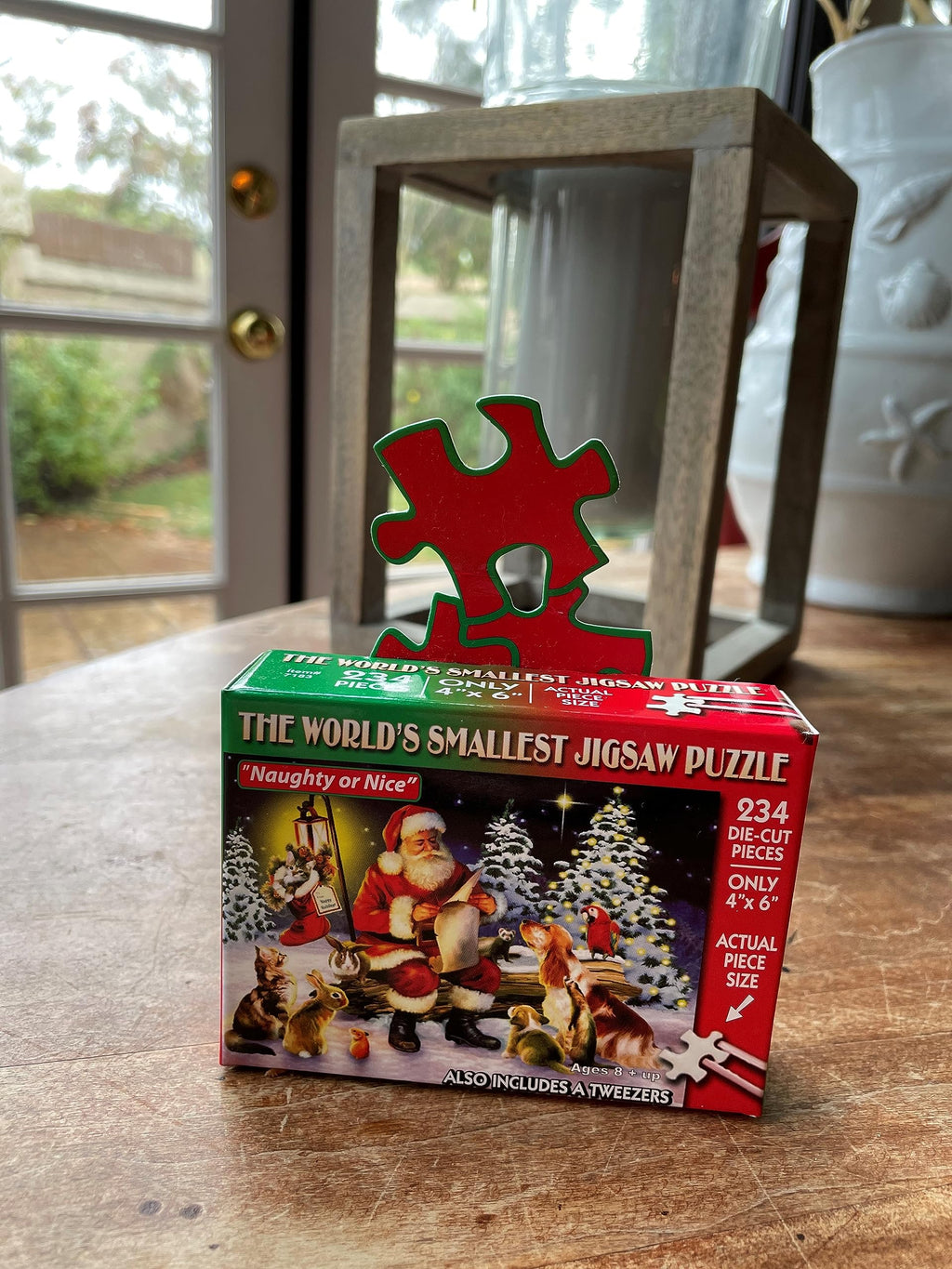 TDC Games World's Smallest Holiday Jigsaw Puzzle - Naughty or Nice - Mini 234-Piece Challenge with Tweezers