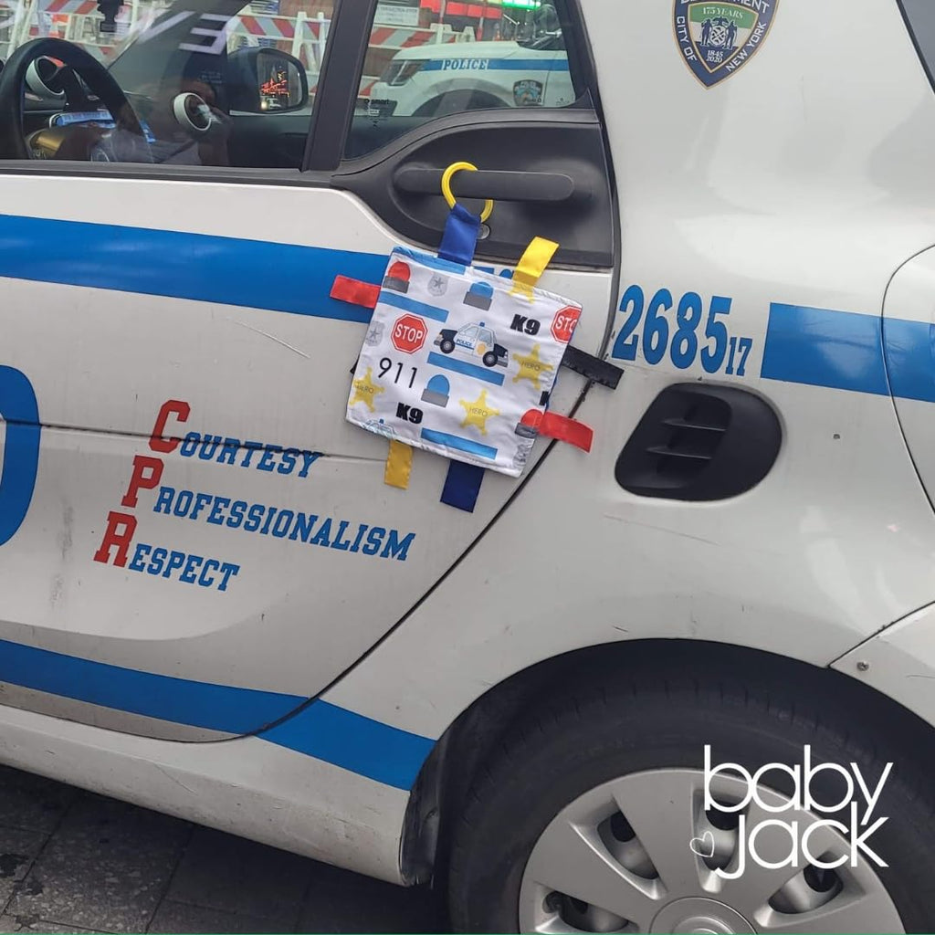 The Learning Lovey 8x8 Inch Police Blue Line Sensory Tag Toy with Crinkle Paper and Stroller Clip
