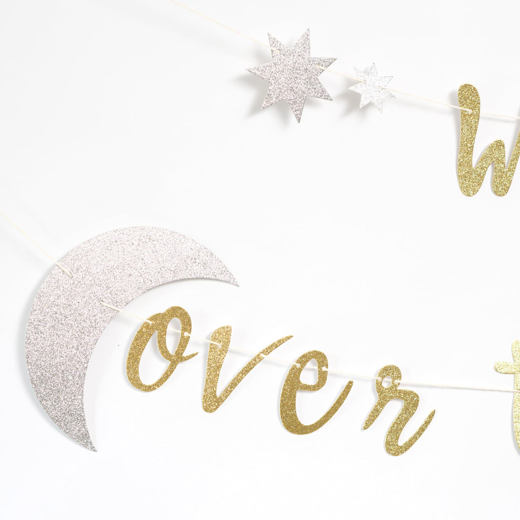We're Over the Moon Banner – Real Gold Glitter Baby Shower & Gender Reveal Decoration, Pre-Strung Cardboard Banner 9x7 Inches